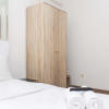 Отель Homey and Simply 2BR at Lagoon Bekasi Town Square Apartment, фото 5