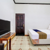 Отель SPOT ON 92623 Mw 46 Guesthouse, фото 3