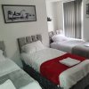 Отель Deluxe Three bed Suite in Liverpool City Center, фото 4