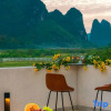 Отель the thousand and one tourism&homestay（yangshuo yulonghe hotel ）, фото 19