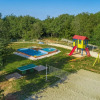 Отель Holiday House with Private Pool for 4-6 Persons in the Holiday Park Jelovci, фото 11