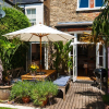 Отель Enchanting Southfields Home by King George's Park, фото 18