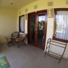 Отель Satu Tiga Cottage, фото 7