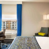 Отель La Quinta Inn & Suites By Wyndham Orlando - Idrive Theme Parks, фото 9