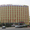 Отель Motel Qingdao Development Zone Middle Changjiang Road, фото 1