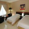 Отель Orchardz Hotel Gajahmada Pontianak в Понтианаке