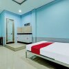 Отель OYO 91987 Archery Residence Syariah, фото 7