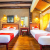 Отель Capital O 2640 Rumah Kayu Cottage Syaria, фото 6