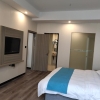 Отель GreenTree Inn Wuxi Huishan District Taihu Huanle Garden Qianqiao Express Hotel, фото 3