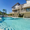 Отель Beachfront With Large Deck Pool Sea Dunes Sailfish A2, фото 12