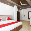 Отель OYO 15566 Hotel Rosewood Inn, фото 6