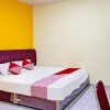Отель OYO 92210 New Town Syariah, фото 7