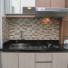 Отель Cozy Stay And Comfort 2Br At Bassura Apartment, фото 2