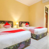 Отель Wisma Guntur II by OYO Rooms, фото 5