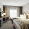 Отель Country Inn & Suites by Radisson, Indianola, IA, фото 21