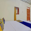 Отель SPOT ON 92930 Syifa Guest House Syariah, фото 12