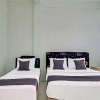 Отель Capital O 91466 Hotel Neu Backpacker Tf Syariah, фото 9