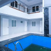 Отель KoolKost Syariah near Lippo Mall Kemang - Minimum Stay 6 Nights, фото 12
