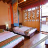 Отель Olive Tree Inn - Lijiang, фото 1