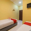 Отель RedDoorz Syariah near Jam Gadang Bukittinggi 2, фото 16