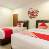 Отель OYO 619 Naufal Guest House Syariah, фото 3