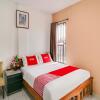 Отель OYO 90024 Botania Homestay and Cafe, фото 9