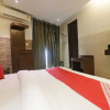 Отель OYO 49069 A Suites, фото 16