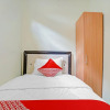Отель OYO 90804 Oma Uti Homestay Syariah, фото 8