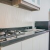 Отель Strategic Studio Apartment with Extra Bed at M-Town Residence, фото 13