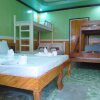 Отель Talindak Beach Cottages, фото 2