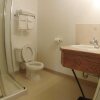 Отель Outpost Motel & Kitchenette Suites, фото 17