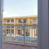 Отель Sleeps 6 in a 4plex w Pool, Only a Block to Beach, фото 8