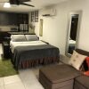 Отель Oversize Studio close to the Beach/Airport, фото 4