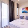 Отель Hestia Luxury Apartments - Romvis 9, фото 7