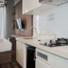 Отель Good Designed And Cozy Studio At Sky House Bsd Apartment, фото 12