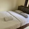 Отель Jatiwinangun Homestay RedPartner, фото 19