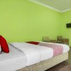 Отель OYO 91005 Cottage Putra Mutun Beach, фото 14