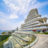 Отель Hupan Yunduan Holiday Hotel, фото 1