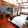 Отель Lijiang Yiran Ethnic custom Viewing Inn, фото 21