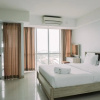 Отель Cozy Living Studio Room Apartment At H Residence, фото 3