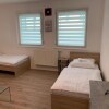 Отель AB Apartments Messezimmer Möhringen - Hostel, фото 2