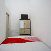 Отель OYO 91746 Kost Sedati Syariah, фото 5