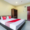 Отель OYO 89660 Raudhah Inn Hotel, фото 6
