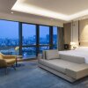 Отель DoubleTree by Hilton Shenzhen Nanshan Hotel & Residences в Шэньчжэне
