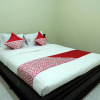 Отель OYO 752 Abz Guest House Syariah, фото 7