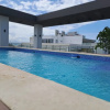 Отель Goistay Elegant Refugio Caribeño 1br Gym Pool Naco, фото 18