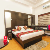 Отель OYO 9242 Le-Leisure Hotel, фото 4