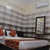 Отель Addhuri Comforts Inn, фото 2