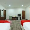 Отель Super OYO Capital O 90434 Marmoris House, фото 3