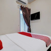 Отель OYO 92233 Srikandi Homestay Syariah, фото 11
